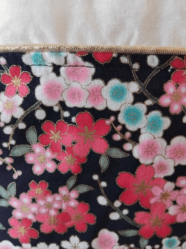 Gigoteuse FLEURS DE CERISIER 0/6 mois personnalisable